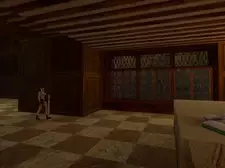 Lara sur le point d'être attaquée par deux pistoleros.