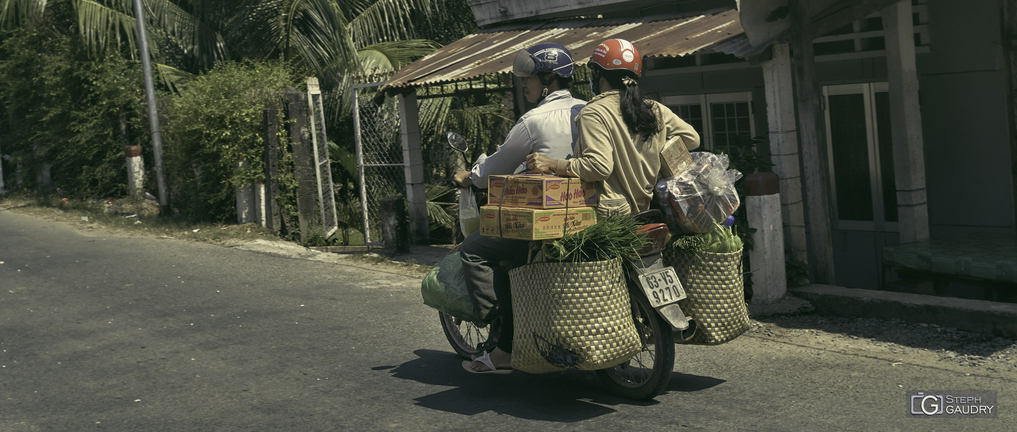 Retour des courses en moto [Klik om de diavoorstelling te starten]