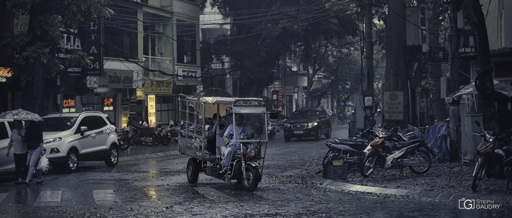 Hanoï sous la pluie [Klik om de diavoorstelling te starten]